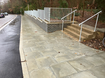 The new retaining wall, footpath and cycleway